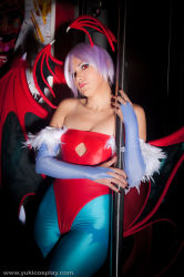 Rule 34 | breasts, capcom, cleavage, cosplay, demon, demon girl, extra wings, head wings, highres, lilith aensland, lilith aensland (cosplay), looking at viewer, low wings, monster, monster girl, photo (medium), pink hair, pole, pole dancing, real life, red eyes, small breasts, stripper pole, vampire (game), wings, yukilefay