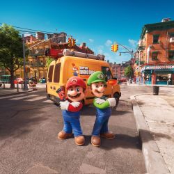 Rule 34 | 1girl, 2boys, brothers, brown hair, building, car, crossed arms, day, dog, facial hair, gloves, grin, highres, looking at viewer, luigi, mario, mario (series), motor vehicle, multiple boys, mustache, nintendo, official art, overalls, pauline (mario), plumber, plunger, road, siblings, smile, standing, street, the super mario bros. movie, traffic light, van, wrench