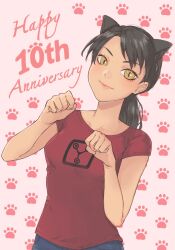 Rule 34 | 1girl, ami yamato, animal ears, anniversary, black hair, blue pants, brown eyes, cat ears, collarbone, commentary, commission, cowboy shot, english commentary, english text, highres, light blush, medium hair, midori matsui, original, pants, paw pose, paw print, paw print background, pink background, ponytail, red shirt, second-party source, shirt, slit pupils, smile, solo, swept bangs, t-shirt