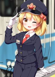 1girl ;d aki_shizuha alternate_costume arm_up black_hat black_jacket black_pants blazer blonde_hair blurry blurry_background blush buttons collared_shirt commentary_request cowboy_shot gloves hair_ornament hat highres jacket lapels leaf_hair_ornament long_sleeves looking_at_viewer medium_hair multiple_unit_train necktie one_eye_closed open_mouth orange_necktie pants peaked_cap ruu_(tksymkw) salute shirt smile solo standing touhou train train_driver translated white_gloves white_shirt yellow_eyes