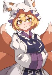 Rule 34 | 1girl, animal hat, blonde hair, blue tabard, breasts, closed mouth, commentary request, dress, fox tail, hands in opposite sleeves, hat, highres, kv-san, large breasts, long sleeves, looking at viewer, mob cap, multiple tails, ofuda, ofuda on clothes, simple background, smile, solo, tabard, tail, touhou, white background, white dress, white hat, wide sleeves, yakumo ran, yellow eyes, yellow tail
