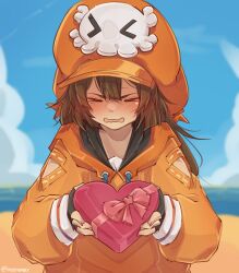 Rule 34 | &gt; &lt;, 1girl, absurdres, black gloves, box, box of chocolates, brown hair, cabbie hat, fingerless gloves, gift, gift box, gloves, guilty gear, guilty gear strive, hat, hat ornament, heart-shaped box, highres, holding, holding gift, hood, hoodie, long hair, long sleeves, looking at viewer, may (guilty gear), mil17459623, open mouth, orange hat, orange hoodie, skull and crossbones, skull hat ornament, valentine