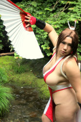 Rule 34 | breasts, brown eyes, brown hair, chouzuki maryou, cosplay, hair ornament, hand fan, large breasts, long hair, photo (medium), plump, ponytail, shiranui mai, shiranui mai (cosplay), sideboob, snk, the king of fighters, thick thighs, thighs, very long hair
