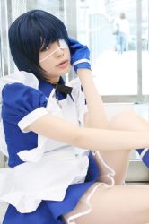 Rule 34 | 1girl, apron, asian, blue eyes, blue gloves, blue hair, blue socks, collar, color contacts, cosplay, cross, cuffs, eyepatch, gloves, handcuffs, highres, ikkitousen, indoors, kneehighs, looking at viewer, maid, maid apron, namada, on floor, photo (medium), puffy short sleeves, puffy sleeves, ryomou shimei, ryomou shimei (cosplay), short sleeves, sitting, socks, solo