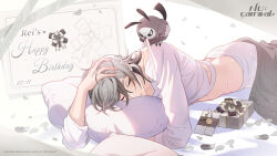 Rule 34 | 1boy, animal, animal on shoulder, bird, bird on shoulder, birthday card, bishounen, box, brown hair, father (nu carnival), gift, gift box, grey hair, happy birthday, highres, letter, long sleeves, looking at another, lying, male focus, nu carnival, official art, on bed, on stomach, owl, parted lips, petals, pillow, rei (nu carnival), shirt, short hair, wax seal, white shirt, yellow eyes