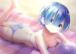 Rule 34 | 10s, 1girl, ass, ball, bare legs, bare shoulders, barefoot, beach, beachball, bikini, blue bikini, blue eyes, blue hair, breasts, cleavage, collarbone, commentary request, dated, day, eyes visible through hair, hair ornament, hair over one eye, hairclip, halterneck, head tilt, leg up, lying, medium breasts, neki (wakiko), on stomach, outdoors, parted lips, re:zero kara hajimeru isekai seikatsu, rem (re:zero), sand, short hair, solo, sparkle, swimsuit, transparent, twitter username, x hair ornament