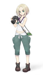 Rule 34 | 1girl, absurdres, blonde hair, boots, brown footwear, camera, camera case, closed mouth, commentary, creatures (company), eyelashes, forehead, full body, game freak, green eyes, green pants, hands up, highres, holding, holding camera, looking at viewer, navel, nintendo, pants, pokemon, pokemon xy, sanj, short hair, simple background, smile, solo, tank top, viola (pokemon), white background, white tank top, wristband