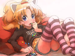 Rule 34 | 1girl, animal ears, blonde hair, blue eyes, blush, candy, cat ears, denim, earrings, eating, fang, feet, food, jewelpet (series), jewelpet twinkle, jewelry, lying, m&amp;m&#039;s, miria marigold mackenzie, no shoes, non-web source, nyama, on back, open mouth, product placement, shirt, short shorts, shorts, solo, striped clothes, striped thighhighs, t-shirt, thighhighs