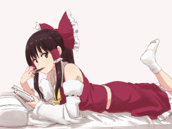 Rule 34 | 1girl, ascot, bare shoulders, bed, black hair, book, bow, brown eyes, commentary request, detached sleeves, eating, food, frilled bow, frills, grey background, hair bow, hair tubes, hakurei reimu, highres, holding, holding book, holding food, leg up, leon (mikiri hassha), long hair, long sleeves, looking at viewer, lying, midriff peek, no shoes, on stomach, parted lips, petticoat, pillow, ponytail, red bow, red skirt, ribbon-trimmed sleeves, ribbon trim, sidelocks, simple background, skirt, skirt set, socks, solo, touhou, white socks, wide sleeves, yellow ascot