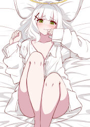 Rule 34 | 1girl, absurdres, ass, bed sheet, blue archive, blush, buttons, closed mouth, collarbone, cross hair ornament, feet out of frame, flat chest, green eyes, grey hair, hair ornament, halo, hare (blue archive), highres, long hair, looking at viewer, moyoron, pillow, shirt, solo, white shirt