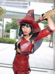 Rule 34 | 1girl, arc system works, bare shoulders, blue eyes, color contacts, cosplay, cowboy shot, green eyes, guilty gear, guitar, hat, i-no, instrument, looking at viewer, minami miki, photo (medium), solo, standing, witch hat