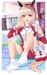 Rule 34 | 1girl, animal ears, blurry, blurry background, cellphone, curren chan (umamusume), evefly megane p, grey hair, highres, horse ears, horse tail, jacket, jersey, looking at viewer, no shoes, open mouth, phone, purple eyes, selfie, sitting, socks, solo, tail, track jacket, track suit, umamusume, white socks