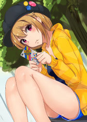 Rule 34 | 1girl, :t, badge, banana (hirane1988), bare legs, black hat, blue shirt, blue shorts, blurry, blurry background, blush, brown hair, button badge, cabbie hat, cellphone, closed mouth, collarbone, commentary request, day, dutch angle, feet out of frame, from below, hair between eyes, hands up, hat, head tilt, holding, holding phone, hood, hood down, hooded jacket, ibuki tsubasa, idolmaster, idolmaster million live!, idolmaster million live! theater days, jacket, knees together feet apart, long sleeves, looking at viewer, looking down, open clothes, open jacket, outdoors, phone, pout, purple eyes, shirt, short hair, shorts, sitting, sleeves past wrists, smartphone, solo, thighs, tree, yellow jacket