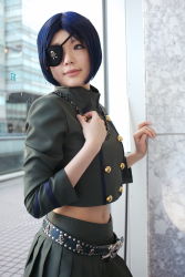 Rule 34 | 1girl, asian, belt, blue hair, blurry, breasts, chrome dokuro, color contacts, cosplay, depth of field, eyepatch, female focus, highres, indoors, jewelry, katekyo hitman reborn!, looking to the side, makeup, mascara, midriff, namada, navel, necklace, parted lips, photo (medium), pleated skirt, short hair, skirt, skull and crossbones, skull belt, small breasts, solo, standing, uniform, window