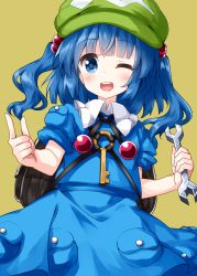 Rule 34 | 1girl, backpack, bag, black bag, blue dress, blue eyes, blue hair, blunt bangs, cowboy shot, dress, flat cap, green hat, hair bobbles, hair ornament, hat, highres, holding, holding wrench, kawashiro nitori, key, looking at viewer, medium hair, one eye closed, open mouth, pocket, pointing, ruu (tksymkw), simple background, smile, solo, standing, teeth, touhou, two side up, wrench, yellow background