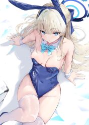 Rule 34 | 1girl, absurdres, animal ears, bare shoulders, blonde hair, blue archive, blue bow, blue bowtie, blue eyes, blue leotard, bow, bowtie, breasts, detached collar, fake animal ears, gyoku seisyoku, halo, highres, leotard, long hair, looking at viewer, medium breasts, official alternate costume, playboy bunny, rabbit ears, solo, strapless, strapless leotard, thighhighs, toki (blue archive), toki (bunny) (blue archive), very long hair, white thighhighs, wrist cuffs