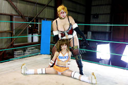 Rule 34 | 2girls, arena, blonde hair, boxing ring, breasts, brown hair, chouzuki maryou, cleavage, cosplay, eyepatch, fingerless gloves, gloves, large breasts, mistress spencer, mistress spencer (cosplay), multiple girls, photo (medium), rebecca welsh, rebecca welsh (cosplay), rumble roses, rumble roses xx, suzuka itsuki, whip, wrestling