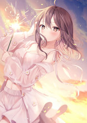 Rule 34 | 1girl, ahoge, blush, breasts, brown eyes, brown hair, camisole, cleavage, closed mouth, cloud, collarbone, copyright request, day, dutch angle, fireworks, floating hair, flower, hair between eyes, hand in own hair, highres, long sleeves, looking at viewer, medium breasts, midriff, off shoulder, outdoors, pink flower, see-through, see-through sleeves, shorts, single bare shoulder, solo, sparkler, striped, sunset, white shorts, yugirlpict