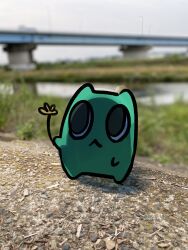 Rule 34 | :&lt;, absurdres, blurry, blurry background, commentary, creature, day, depth of field, flower, gomidasu (kamitsubaki studio), grass, highres, holding, holding flower, isekai joucho (artist), kamitsubaki studio, no humans, outdoors, overpass, pebble, photo background, river, shadow, standing, upturned eyes, yellow flower