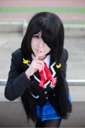 Rule 34 | 1girl, artist request, asian, black hair, black pantyhose, blazer, blue skirt, blurry, color contacts, cosplay, date a live, depth of field, finger to mouth, from above, hair over one eye, jacket, long hair, looking at viewer, makeup, mascara, miniskirt, pantyhose, photo (medium), pleated skirt, red eyes, school uniform, shushing, skirt, solo, standing, tokisaki kurumi, tokisaki kurumi (cosplay), twintails