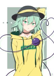 Rule 34 | 1girl, absurdres, alternate costume, black hat, border, clothes writing, contemporary, drawstring, furai art, green eyes, green hair, grey background, hat, hat ribbon, heart, heart of string, highres, hood, hoodie, jewelry, komeiji koishi, long sleeves, looking at viewer, open mouth, pendant, ribbon, short hair, simple background, solo, third eye, touhou, upper body, white border, yellow hoodie, yellow ribbon