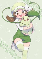 Rule 34 | 1girl, alternate color, alternate costume, brown eyes, brown hair, chikorita, creatures (company), crossed arms, game freak, gen 2 pokemon, green background, green headwear, green thighhighs, happy, highres, holding, hug, large hat, leg up, looking at viewer, lyra (pokemon), nintendo, open mouth, overalls, pokemon, pokemon (creature), pokemon hgss, pumpkinpan, ribbon, shirt, short twintails, smile, thighhighs, twintails, vine whip, white footwear, white ribbon, white shirt