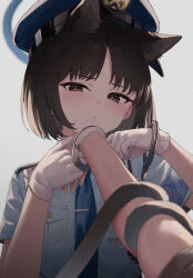 Rule 34 | 1girl, 1other, absurdres, animal ears, black eyes, black hair, blue archive, blue headwear, blue necktie, blue shirt, blush, cat ears, cat tail, closed mouth, collared shirt, cuffs, gloves, hat, highres, kikyou (blue archive), looking at viewer, multiple tails, necktie, pizza (pizzania company), police, police hat, police uniform, policewoman, shackles, shirt, short hair, short sleeves, tail, two tails, uniform, upper body, white gloves