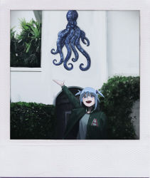 Rule 34 | 1girl, absurdres, alternate costume, blue eyes, blue hair, blush, bush, gawr gura, green jacket, highres, hololive, hololive english, jacket, letterman jacket, looking at viewer, octopus, open hand, open mouth, polaroid, sharp teeth, solo, teeth, tree, vincent wu, virtual youtuber