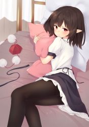 Rule 34 | 1girl, :/, bed, black hair, black pantyhose, black skirt, blush, commentary, curtains, feet out of frame, hat, highres, hugging object, kanpa (campagne 9), looking at viewer, lying, on bed, on side, pantyhose, petticoat, pillow, pillow hug, pointy ears, pom pom (clothes), puffy short sleeves, puffy sleeves, red eyes, red hat, shameimaru aya, shirt, short hair, short sleeves, skirt, solo, thighband pantyhose, tokin hat, touhou, uneven eyes, untucked shirt, unworn hat, unworn headwear, white shirt