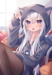 Rule 34 | 1girl, :o, animal ears, animal hood, arm up, black pantyhose, blush, breasts, cat ears, cat girl, cat hood, cat tail, cleavage, collarbone, commentary request, day, drawn whiskers, eyes visible through hair, fake animal ears, fang, feet out of frame, grey hair, grey hoodie, hair between eyes, hair ornament, hair over shoulder, hairclip, hand on own ear, hand up, highres, hood, hood up, hoodie, indoors, knee up, long hair, long sleeves, looking at viewer, no pants, open mouth, original, pantyhose, pillow, puffy long sleeves, puffy sleeves, purple eyes, ringouulu, sidelocks, sitting, skin fang, sleeves past wrists, small breasts, solo, tail, tail raised, twitter username, white hair, window, zipper