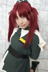 Rule 34 | 1girl, boots, breasts, closed mouth, cosplay, cosplay photo, gundam, gundam seed, gundam seed destiny, lips, long sleeves, looking at viewer, meyrin hawke, military, military uniform, photo (medium), red hair, smile, solo, tsukimi, twintails, uniform