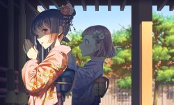 Rule 34 | 2girls, black hair, blue kimono, blue sky, blurry, bouzu (bonze), brown hair, commentary request, day, depth of field, floral print, flower, from side, furisode, green eyes, hair bun, hair flower, hair ornament, japanese clothes, kimono, looking at viewer, multiple girls, open mouth, original, outdoors, own hands together, parted lips, pink kimono, praying, print kimono, red eyes, sash, short hair, shrine, single hair bun, sky, standing, tree, wide sleeves