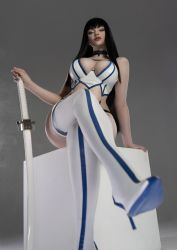 Rule 34 | alina becker, bare shoulders, black hair, blue eyes, boots, breasts, clothes, collar, cosplay, female focus, from below, highres, holding, holding sword, holding weapon, katana, kill la kill, kiryuuin satsuki, kiryuuin satsuki (cosplay), long hair, looking down, medium breasts, model, partially undressed, photo (medium), simple background, sitting, solo, sword, thigh boots, weapon, white legwear
