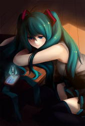 Rule 34 | 1girl, ahoge, black skirt, black thighhighs, blue eyes, character name, closed mouth, english text, green hair, grey shirt, hatsune miku, highres, hologram, long hair, pleated skirt, shirt, sitting, skirt, sleeveless, sleeveless shirt, solo, standing, table, thighhighs, twintails, uusquid, very long hair, vocaloid, wariza, wooden floor