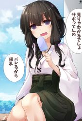 Rule 34 | 1girl, absurdres, alternate costume, black hair, day, feet out of frame, food, green hakama, hair between eyes, hakama, hakama skirt, hibiki (zerocodo), highres, holding, holding food, japanese clothes, kantai collection, kitakami (kancolle), long hair, long sleeves, miko, open mouth, popsicle, purple eyes, signature, skirt, solo, speech bubble, translation request, wide sleeves