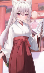 Rule 34 | 1girl, absurdres, animal ear fluff, animal ears, blurry, blurry background, blush, bow, cat ears, closed mouth, commentary request, depth of field, gohei, grey hair, hair between eyes, hakama, hakama skirt, highres, holding, japanese clothes, kimono, long sleeves, looking at viewer, miko, nail polish, original, pink nails, purple eyes, red bow, red hakama, sirotuki ito, skirt, solo, torii, white kimono, wide sleeves