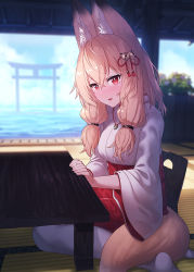 Rule 34 | 1girl, animal ear fluff, animal ears, bell, blonde hair, blue sky, fang, fox ears, fox tail, hair bell, hair between eyes, hair ornament, ibuki notsu, japanese clothes, jewelry, jingle bell, kimono, magatama, magatama necklace, necklace, original, parted lips, red eyes, red skirt, sitting, skirt, sky, smile, solo, table, tail, tatami, torii, white kimono, white legwear