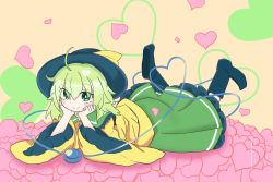 Rule 34 | 1girl, ahoge, black hat, black socks, blouse, blush, bright pupils, closed mouth, collared shirt, commentary request, eyeball, eyes visible through hair, frilled shirt collar, frilled skirt, frilled sleeves, frills, full body, green eyes, green hair, green skirt, hair between eyes, hands on own cheeks, hands on own face, hat, hat ribbon, head rest, heart, heart of string, komeiji koishi, legs up, long skirt, long sleeves, looking at viewer, lying, medium hair, no shoes, on stomach, ribbon, shirt, sidelocks, simple background, skirt, smile, socks, solo, tatutaniyuuto, third eye, touhou, wavy hair, wide sleeves, yellow background, yellow ribbon, yellow shirt