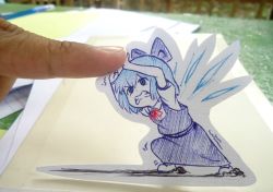Rule 34 | 1girl, blue eyes, blue hair, bow, cirno, clenched teeth, detached wings, hair bow, ice, ice wings, isaki tanaka, paper child, papercraft (medium), photo (medium), pushing, ribbon, short hair, struggling, teeth, touhou, unconventional media, wings