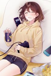 Rule 34 | 1girl, akikuriii, bag of chips, black shorts, blush, bob cut, brown hair, can, cd case, cellphone, chips (food), closed eyes, commentary, controller, drawstring, drink, drooling, food, from above, game controller, hair between eyes, hair strand, handheld game console, highres, holding, holding can, holding controller, holding drink, holding game controller, hood, hood down, hoodie, long sleeves, lying, messy hair, nintendo switch lite, on ground, original, phone, pillow, playstation controller, potato chips, short shorts, shorts, sleeping, smartphone, striped clothes, striped shorts, yellow hoodie