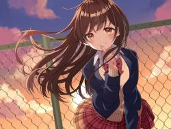 Rule 34 | 1girl, brown eyes, brown hair, cardigan, chain-link fence, fence, finger to mouth, hair blowing, highres, long hair, looking at viewer, original, outdoors, plaid, plaid skirt, school uniform, shushing, skirt, smile, solo, sunset, uramakaron, wind