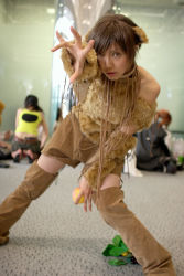 Rule 34 | 1girl, animal ears, asian, blurry, brown eyes, brown hair, choker, cosplay, depth of field, dog ears, food, fruit, fur, grapes, indoors, leaf, leaning forward, looking at viewer, matching hair/eyes, namako, outstretched arm, peach, photo (medium), short hair, solo focus, thighhighs, tm revolution, wild rush