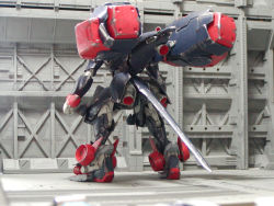 Rule 34 | ant-lion, arinko (ant-lion), arms at sides, bad id, bad pixiv id, clenched hands, from behind, full body, gunpla, mecha, metal wolf, metal wolf chaos, model kit, model kit (medium), no humans, photo (medium), real life, robot, standing, unconventional media