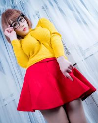Rule 34 | 1girl, breasts, brown eyes, brown hair, clothes, cosplay, female focus, glasses, highres, large breasts, looking at viewer, medium hair, model, photo (medium), scooby-doo, shibuya kaho, solo, velma dace dinkley, velma dace dinkley (cosplay), wig