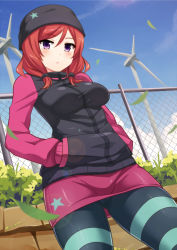 Rule 34 | 10s, 1girl, beanie, chain-link fence, day, fence, hands in pockets, hat, jacket, looking at viewer, love live!, love live! school idol festival, love live! school idol project, mmrailgun, nishikino maki, open mouth, pantyhose, purple eyes, red hair, short hair, sky, solo, striped clothes, striped pantyhose, track jacket, wind turbine, windmill