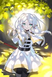 Rule 34 | 1girl, belt, black belt, capelet, commentary, earrings, elf, falken (yutozin), frieren, green eyes, highres, holding, holding staff, jewelry, long sleeves, looking at viewer, mage staff, petals, pointy ears, shirt, skirt, solo, sousou no frieren, staff, striped clothes, striped shirt, white capelet, white skirt