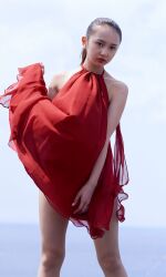 Rule 34 | 1girl, absurdres, backless outfit, blurry, blurry background, dress, highres, komiya arisa, looking at viewer, open clothes, outdoors, photo (medium), ponytail, red dress, standing, voice actor