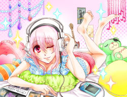 Rule 34 | 1girl, bad id, bad pixiv id, barefoot, blush, breasts, digital media player, female focus, gradient background, headphones, large breasts, long hair, looking at viewer, lying, nitroplus, on stomach, one eye closed, pink eyes, pink hair, polka dot, polka dot background, smile, sogi-me, solo, super sonico, underwear