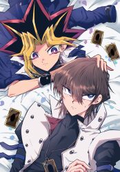 2boys black_hair black_shirt blonde_hair blue_eyes blue_jacket brown_hair card_pendant coat fk_0046 highres jacket kaiba_seto male_focus medium_hair multiple_boys purple_eyes purple_hair shirt short_hair spiked_hair trading_card white_coat yami_yugi yu-gi-oh! yu-gi-oh!_duel_monsters