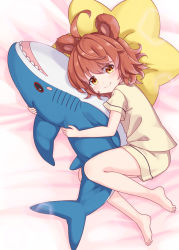 Rule 34 | 1girl, ahoge, animal ears, barefoot, bed sheet, blush, borrowed character, brown eyes, brown hair, brown shirt, brown shorts, closed mouth, commentary request, full body, hair between eyes, harada (sansei rain), highres, ikea shark, looking at viewer, lying, hugging object, on side, original, shirt, short shorts, short sleeves, shorts, smile, solo, star-shaped pillow, stuffed animal, stuffed shark, stuffed toy